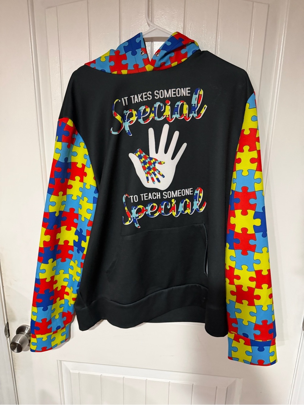 Source Unknown Autism Black Hoodie with Multicolor Puzzle Sleeves